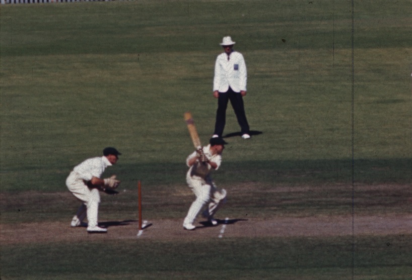 Frame capture of Don Bradman hitting a boundary.