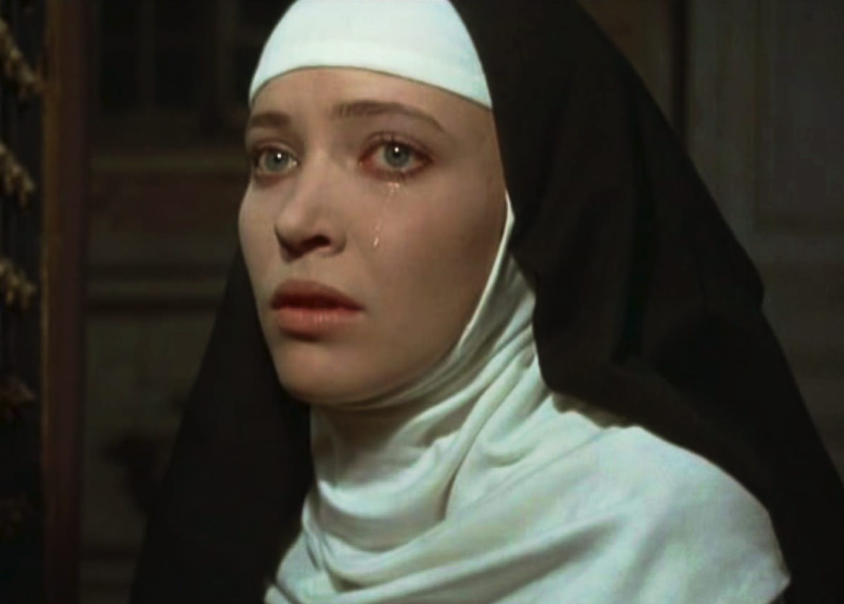 Close up of a nun crying