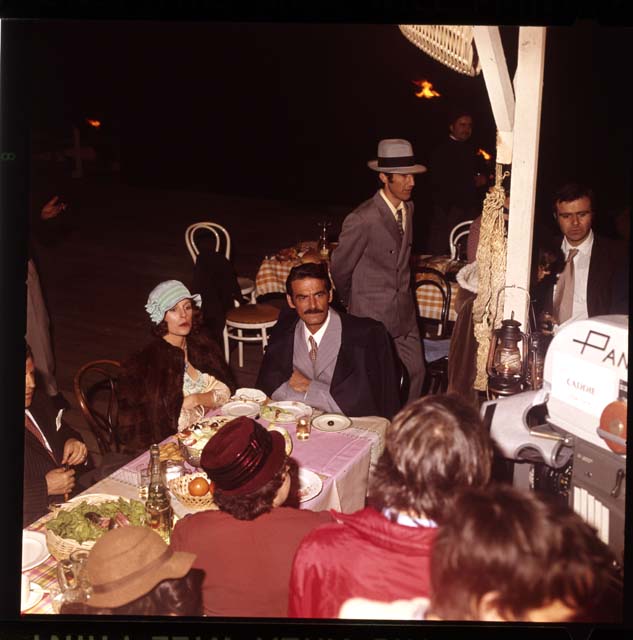 Helen Morse and Takis Emmanuel on the set of Caddie