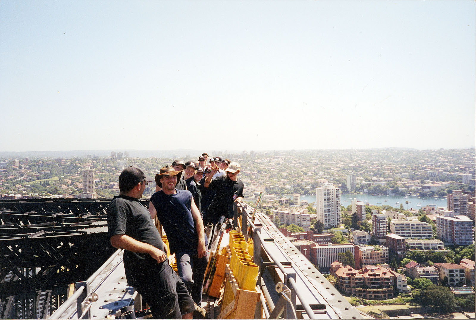 Karen with crew installing pyrotechnics on top of the Sydney Harbour Bridge
