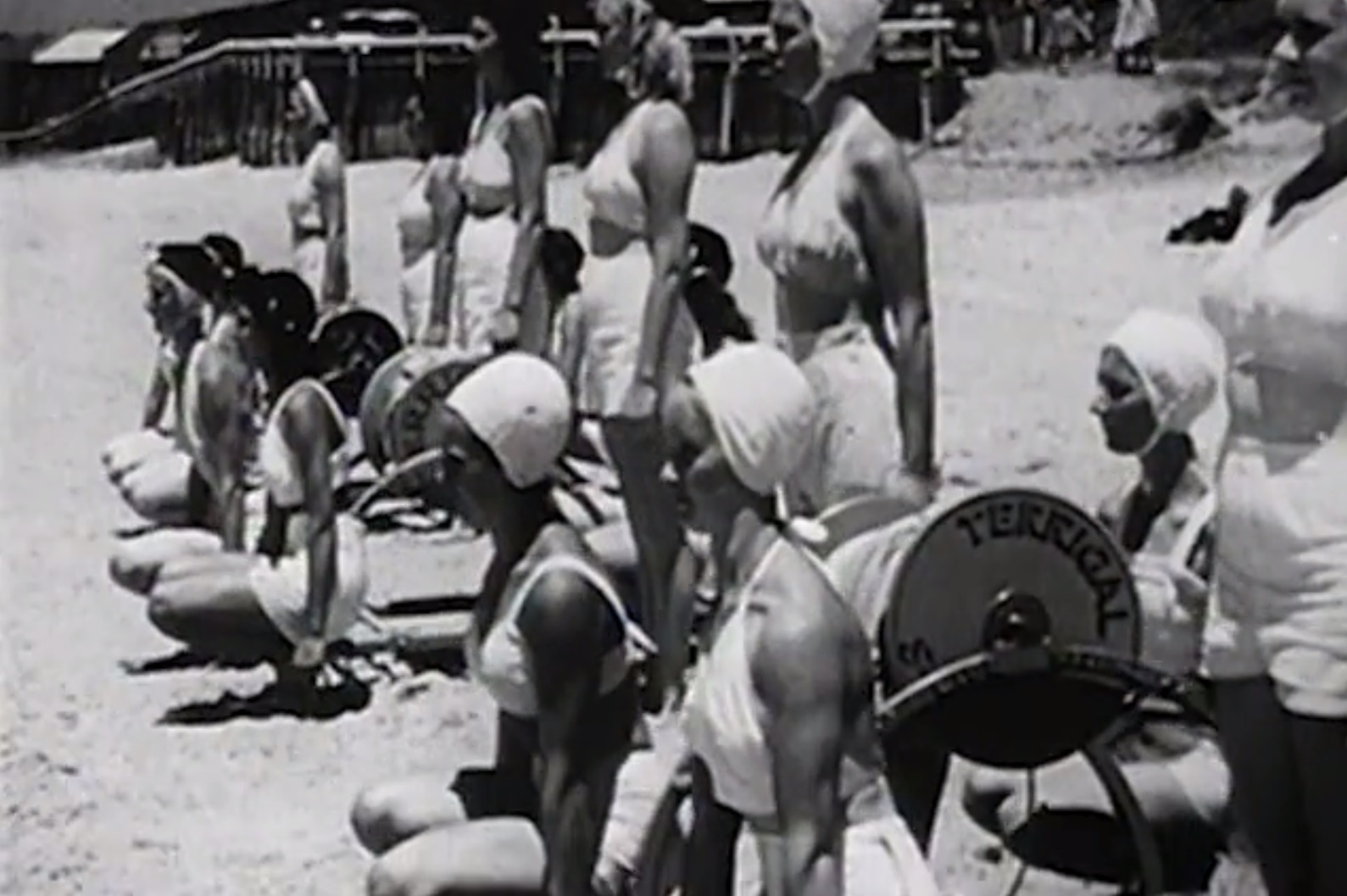A group of female lifesavers doing drills on Terrigal beach during the Second World War