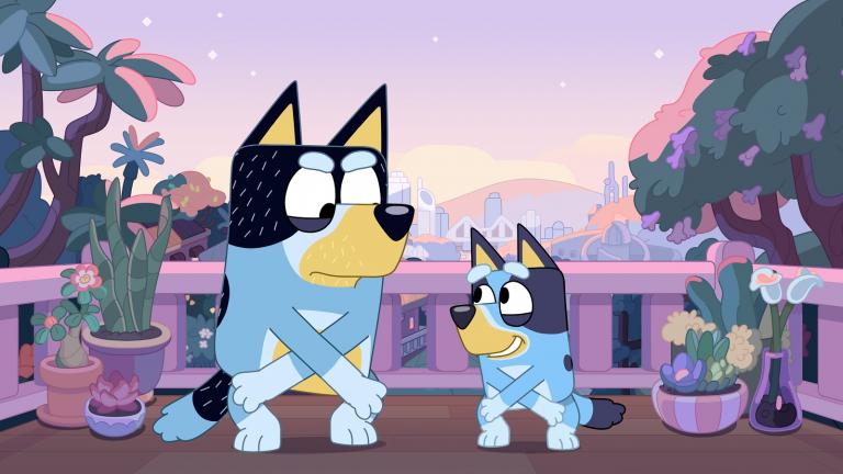 Bluey's Brisbane backdrop Animated still of two blue heeler dogs dancing in the twilight with the skyline of Brisbane City in the background.