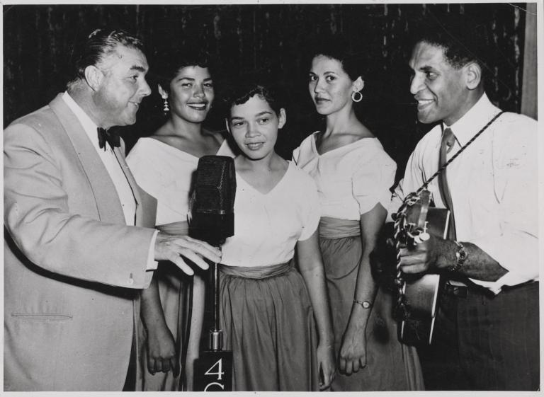 Terry Dear during a rehearsal with The Reading Sisters (Dulcie, Phronsie and Wilma) and their uncle (and brother of singer Georgia Lee), guitarist Walter Pitt.