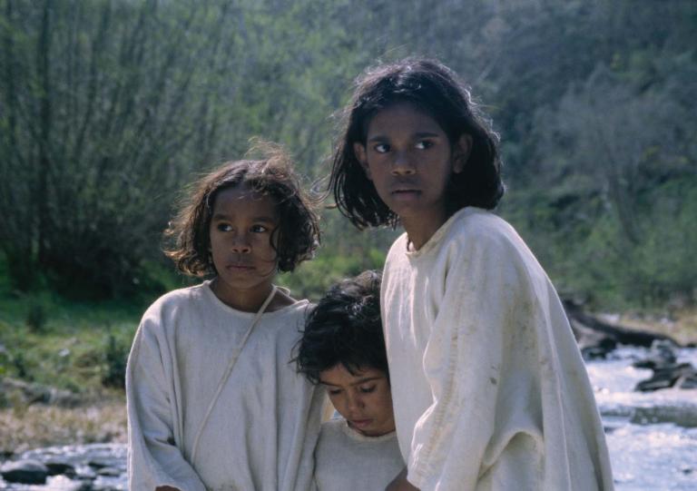Molly, Gracie and Daisy walking through a creek bed in a still from the film Rabbit-Proof Fence. Molly, Gracie and Daisy walking through a creek bed in a still from the film Rabbit-Proof Fence.