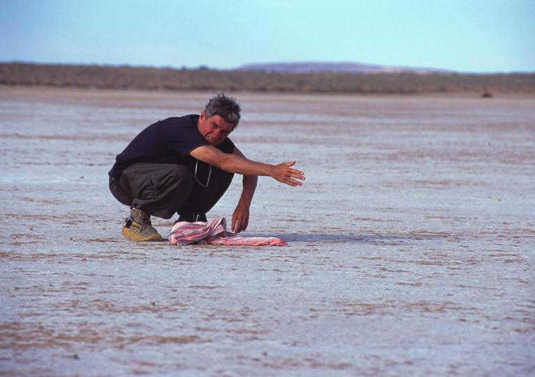 Cinematographer Christopher Doyle on a salt pan shooting the film Rabbit-Proof Fence. Cinematographer Christopher Doyle on a salt pan shooting the film Rabbit-Proof Fence.