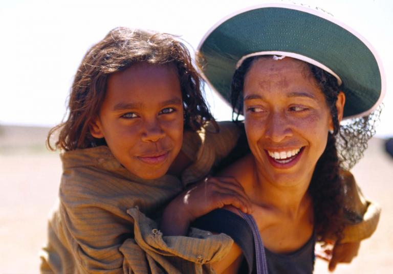 Laura Monaghan with children's drama coach Rachael Maza on the set of the film Rabbit-Proof Fence. Laura Monaghan with children's drama coach Rachael Maza on the set of the film Rabbit-Proof Fence.