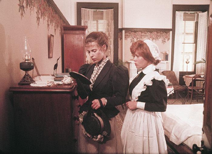 Minnie the maid helps the French mistress search Miranda's room in a scene cut from Picnic at Hanging Rock. Minnie the maid helps the French mistress search Miranda's room in a scene cut from Picnic at Hanging Rock.