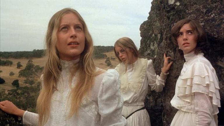 Miranda, Marion and Irma on Hanging Rock in a still from Picnic at Hanging Rock.