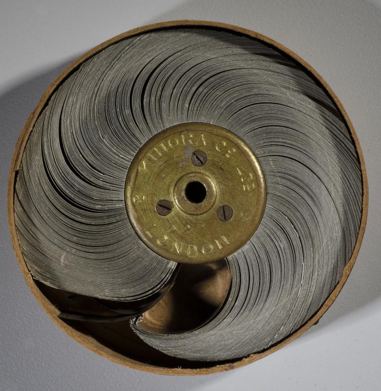 A Kinora reel inside its original housing