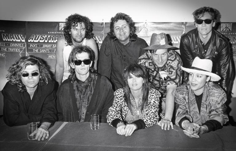 Performers from the 1986 Australian concert series 'Australian Made'. Front: Michael Hutchence, Sean Kelly, Chrissy Amphlett, Kate Ceberano. Back: Jimmy Barnes, Chris Bailey, Greedy Smith, David McComb.