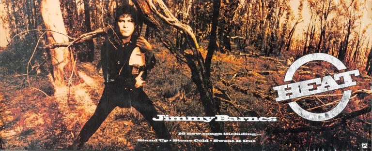 Singer Jimmy Barnes in a bush scene, standing, legs apart, wearing black and holding a guitar. On the left is the name of the album in white text. Text at bottom reads 'Jimmy Barnes 16 new songs including...stand up, stone cold, sweat it out'.