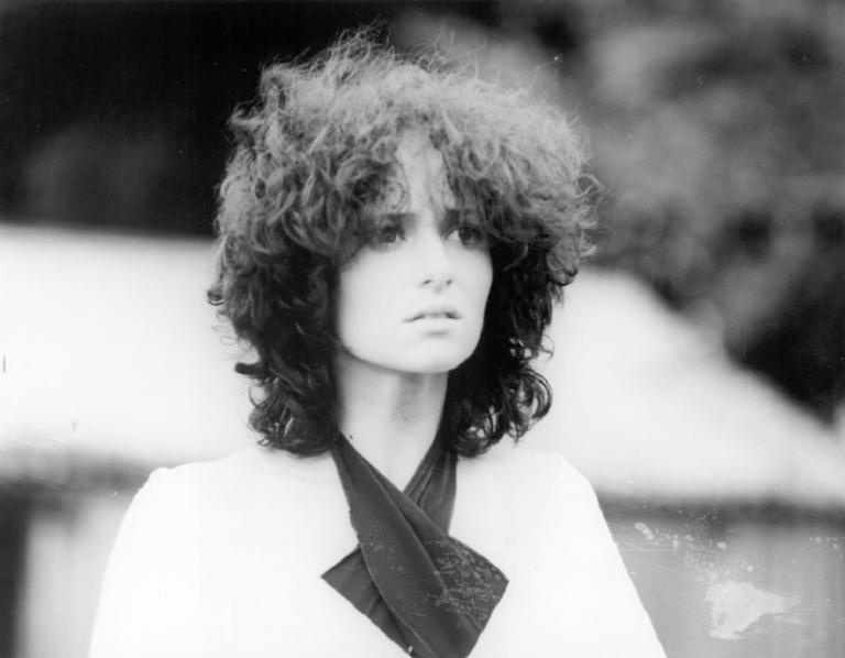 Joanne Samuel as Jessie Rockatansky in Mad Max 1 looking worried. Joanne Samuel as Jessie Rockatansky in Mad Max 1 looking worried