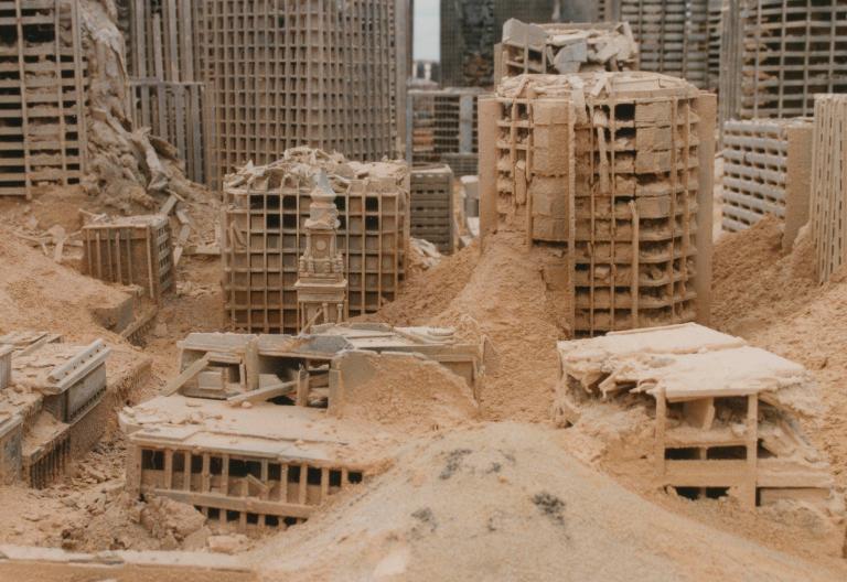 Close up of a model set of buildings created for the set of post-apocalyptic Sydney in Mad Max Beyond Thunderdome. The clock tower of the General Post Office in Martin Place is recognisable amongst the rubble. Close up of a model set of buildings created for the set of post-apocalyptic Sydney in Mad Max Beyond Thunderdome. The clock tower of the General Post Office in Martin Place is recognisable amongst the rubble.