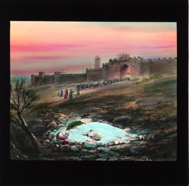 Martyr lying dead with group walking off in the distance