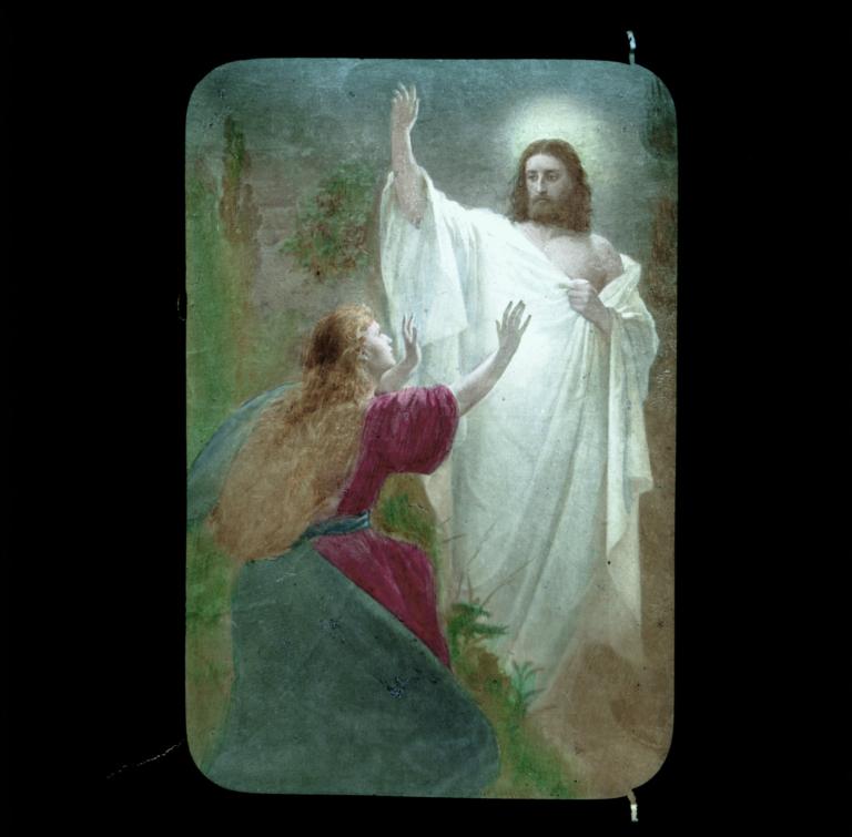 Woman in red with blue cape kneeling before Christ