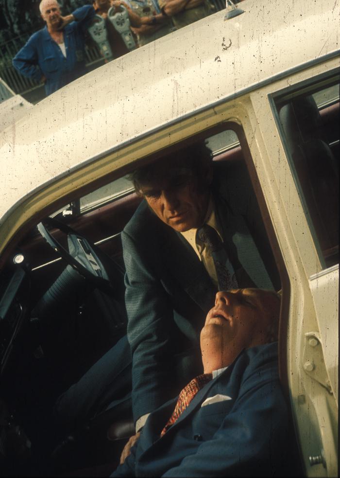 Production still from episode 383 'The Assassin' Production still from The Assassin episode of Homicide, Alwyn Kurts slumped in car with Leonard Teale over him