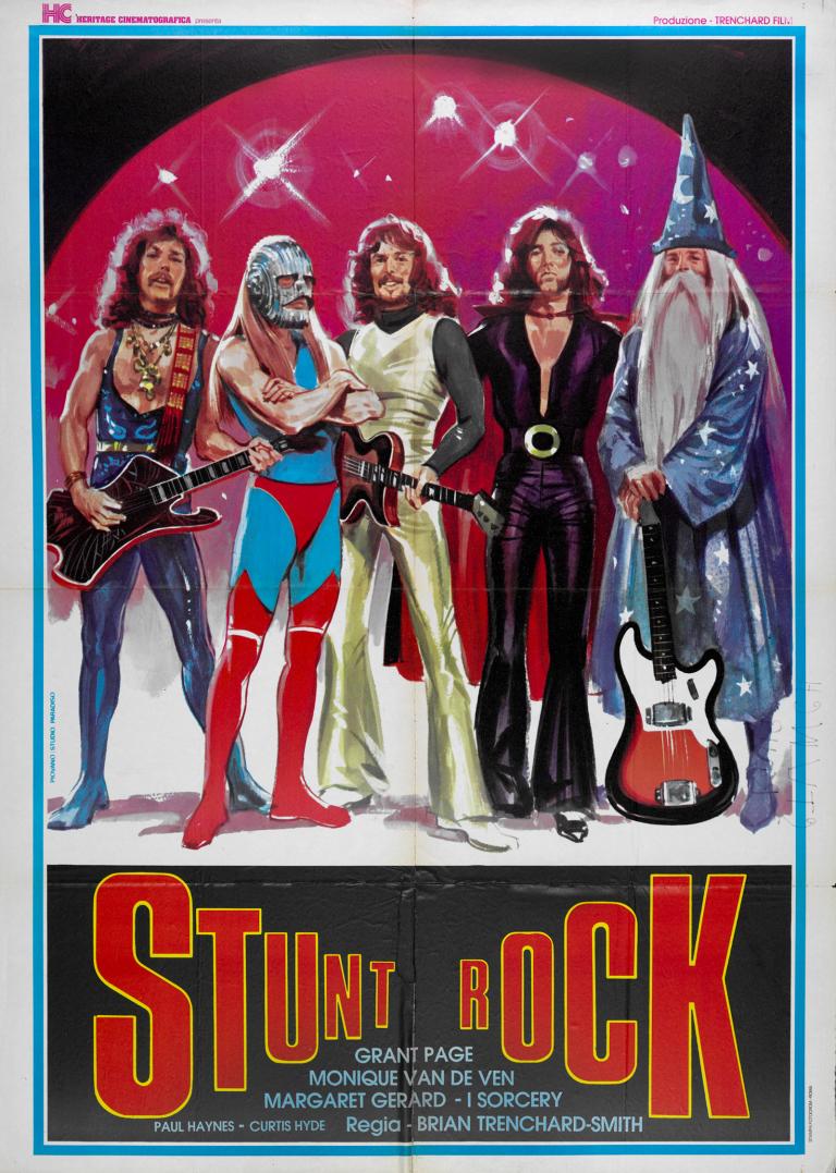Stunt Rock movie poster for Italian release Poster art for film 'Stunt Rock'. Five men in various costumes standing in a row, looking like a 'glam' rock band. Some are dressed in leotards, one is dressed like a wizard and 3 are holding guitars.