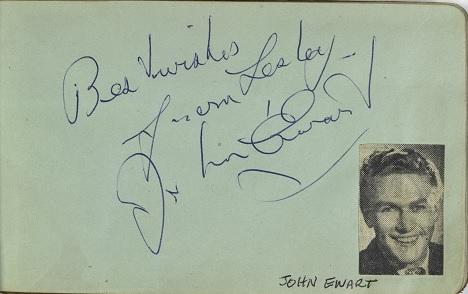 John Ewart's autograph with picture cut from a magazine in Lesley Cansdell's autograph book
