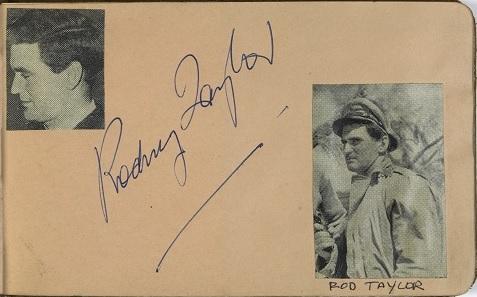Rod Taylor's autograph with two pictures cut from a magazine in Lesley Cansdell's autograph book