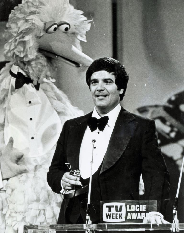 Big Bird from Sesame Street, in a guest appearance at the TV Week Logie Awards in 1983, presents Simon Townsend with an award. 
