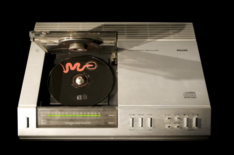 Philips CD 100 Compact Disc Player, silver and black, circa 1982