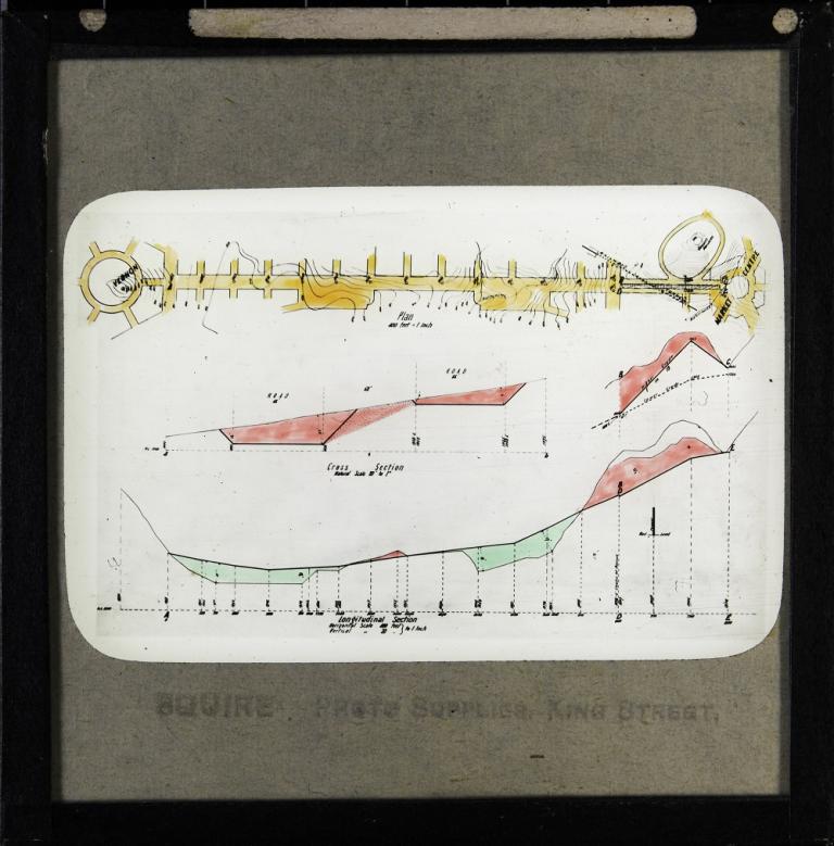 Glass slide showing a plan, two cross section drawings and a longitudinal section drawing of the road between Vernon, which Walter Burley Griffin also called the Civic Centre, and Market Centre, which is now the suburb of Russell. 