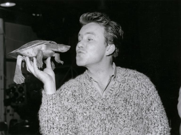 Johnny O'Keefe kissing a tortoise