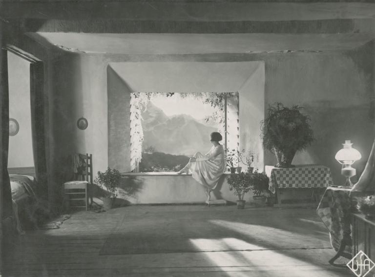 Leni Riefenstahl sits looking out the window in a still from the German film Der Heilige Berg, 1926.
