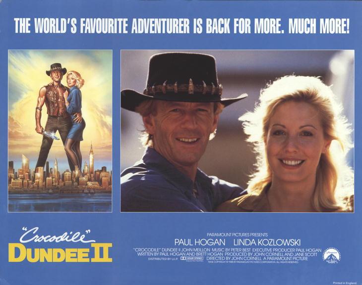 Mick Dundee in love A lobby card for Crocodile Dundee II. The tagline says 'The world's favourite adventurer is back for more. Much more!'. There are two pictures of Paul Hogan (Mick Dundee) and Linda Kozlowski (Sue Charlton) and production company, cast and crew information