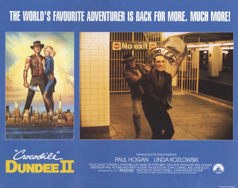 Dundee bins the baddies A lobby card for Crocodile Dundee II. There is a picture of Paul Hogan (Mick Dundee) and Linda Kozlowski (Sue Charlton) and another of Dundee putting a bin over a criminal's head (played by Anthony Crivello) production company, cast and crew information