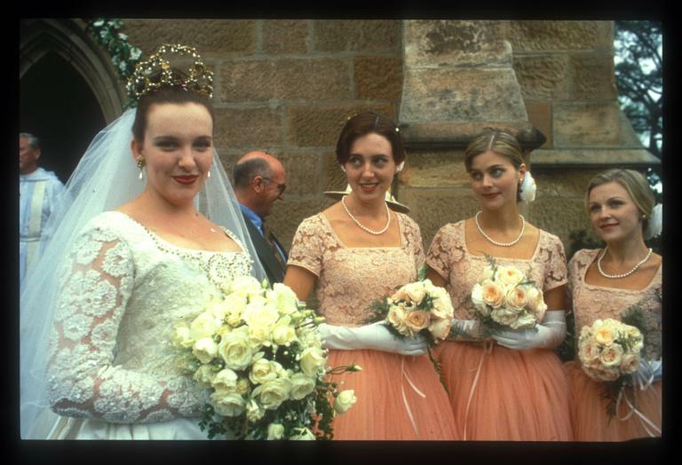 Muriel and her bridesmaids Muriel (Toni Collette) and bridesmaids Tania (Sophie Lee), Cheryl (Rosalind Hammond) and Janine (Belinda Jarrett)