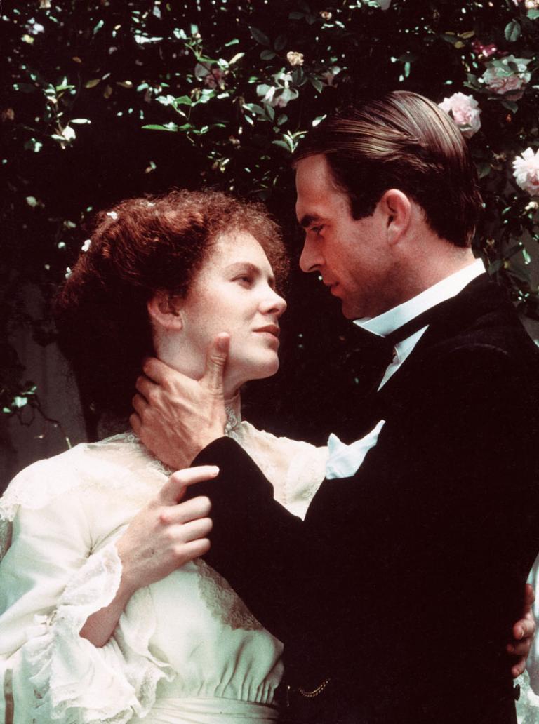 Judy Davis and Sam Neill in My Brilliant Career Judy Davis as Sybylla and Sam Neill as Harry embrace. He is touching her neck and she is touching his arm. They look at each other lovingly.