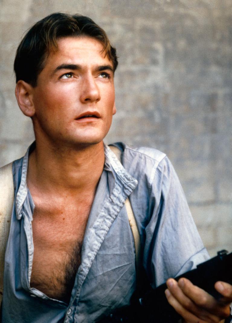 Lewis Fitz-Gerald in Breaker Morant Lewis Fitz-Gerald as Lt. George Ramsdale Witton in Breaker Morant. He's wearing a shirt that is unbuttoned.