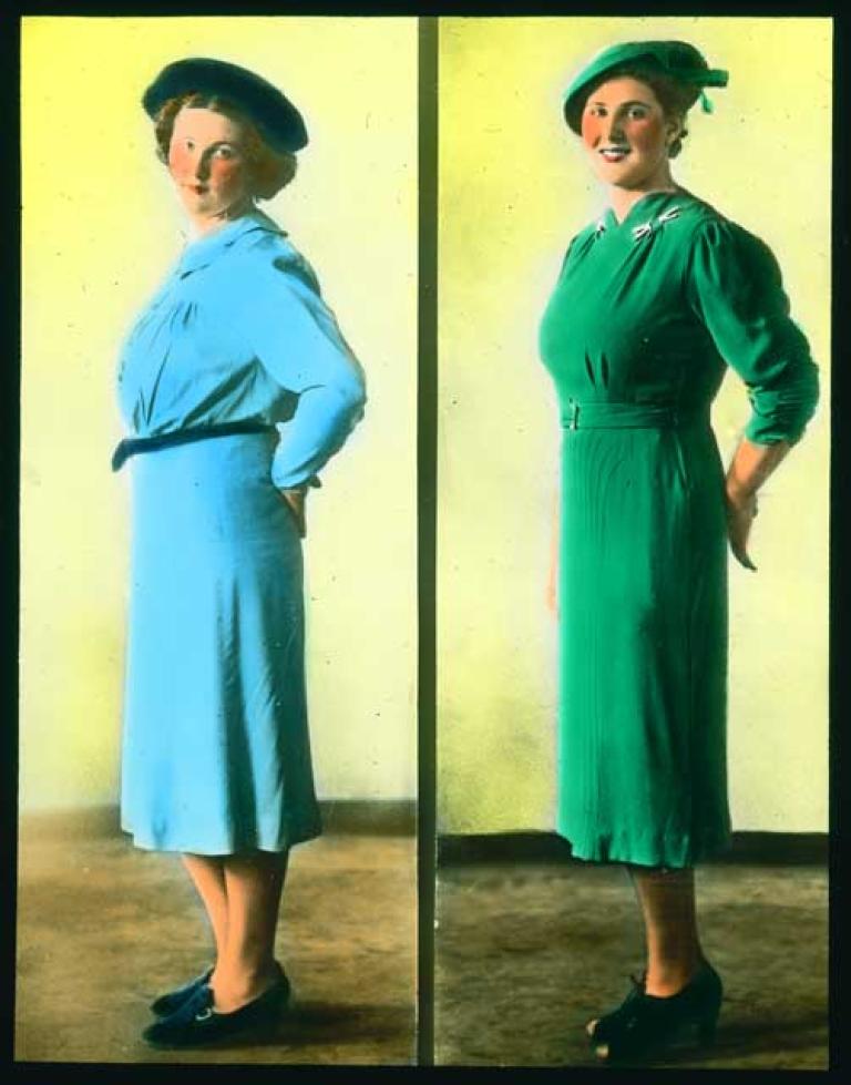 A side-by-side comparison of a woman dressed in two different dresses and hats. The slide is hand-coloured with a yellow background.