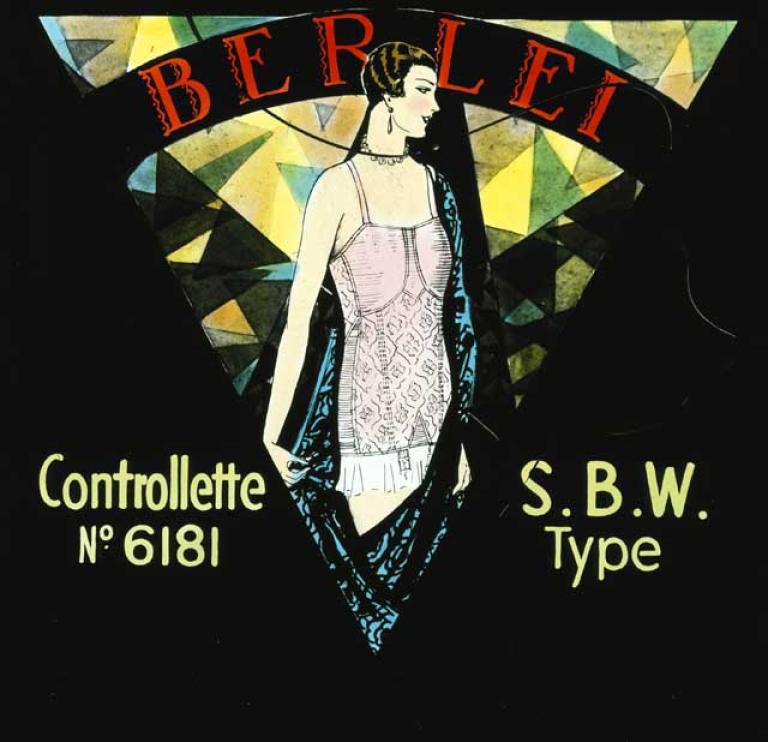 Hand-coloured glass slide image of a woman in a pink foundation garment. It has art deco imagery including a triangular border and line work.