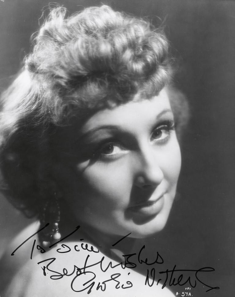 Studio portrait of Googie Withers. Autographed in black texta 'To Jillie, Best Wishes Googie Withers'.