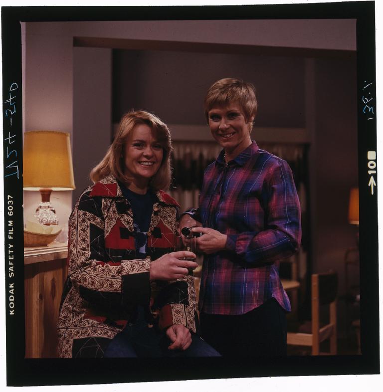 Fiona Spence and Elspeth Ballantyne having a drink and posing for the camera