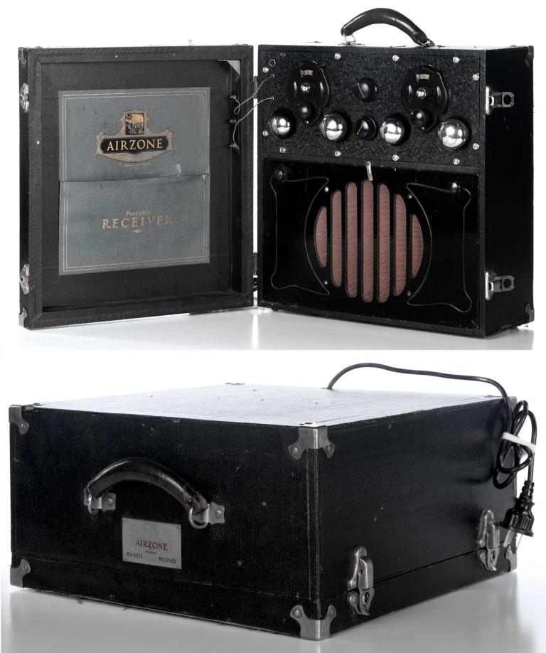 A portable radio receiver with 'Airzone' branding that folds into a carry case. 