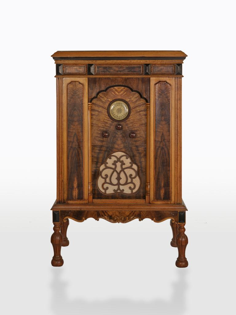 Radio receiver, c1920s, housed in an ornate wooden box.