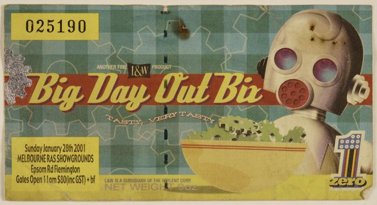 A photo of a ticket for Big Day Out. It has a cartoon of a white robot with a round red mouth at a kitchen table. In the top left there is the ticket number "025190".