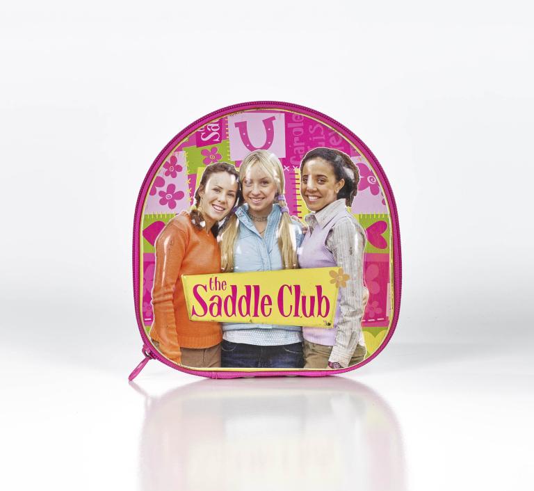 A photo of a CD wallet with the main characters from 'The Saddle Club' on the front.