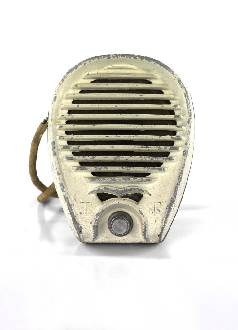 Vintage drive-in speaker from the 1950s with a weathered metal exterior