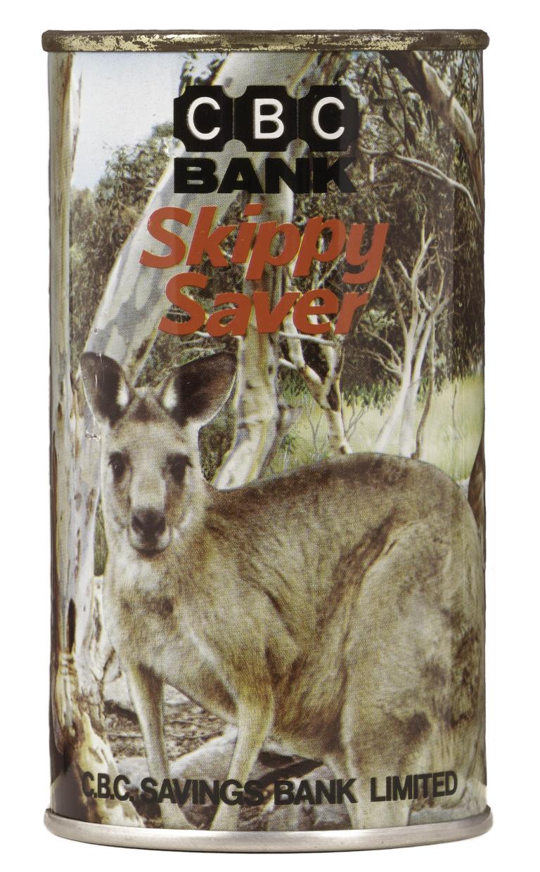 Vintage tin with photo of kangaroo in the outback, labelled 'CBC Bank' and 'Skippy Saver', from C.B.C Savings Bank Limited