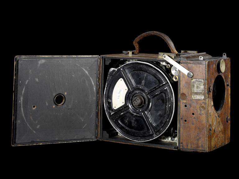 Andre Debrie 'Parvo' camera showing film reel and wooden casing