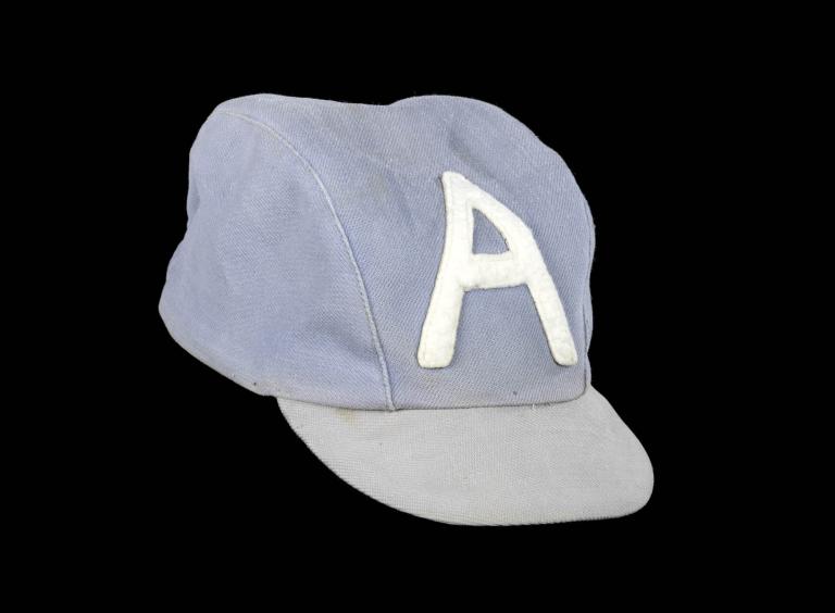 Light blue felt schoolboy cap with white letter ‘A’, worn by AC/DC guitarist Angus Young as part of his iconic stage costume