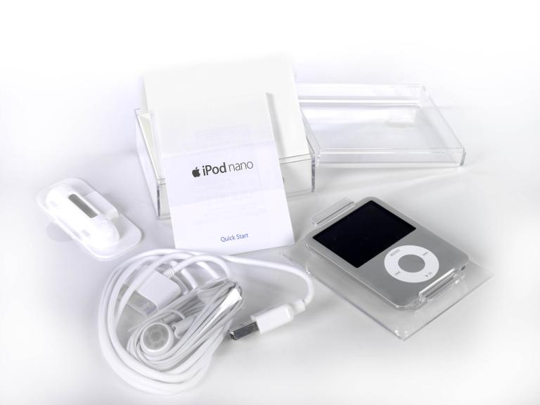 iPod Nano with accessories including earphones and instruction manual from 2006