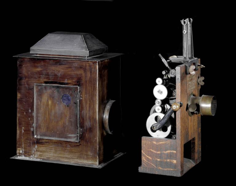 Edison Movie projector from 1897, with wooden housing and exposed metal gears