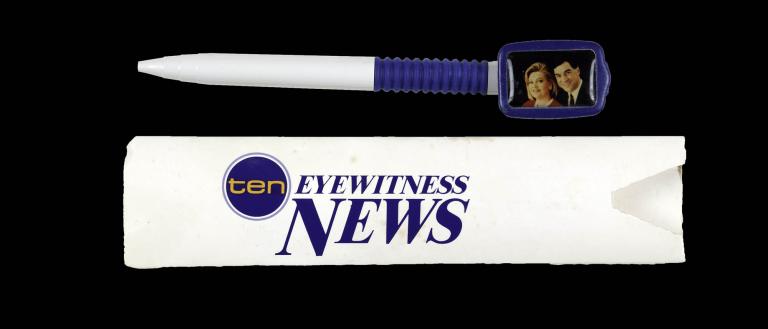 Promotional pen displayed above its case, labeled ‘Eyewitness News,’ used for Network Ten news branding