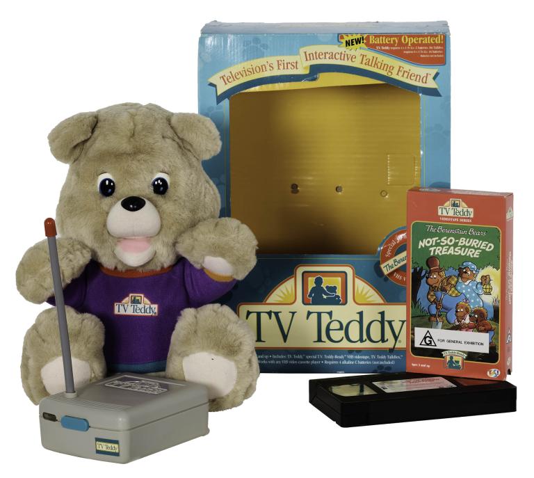 TV Teddy plush toy with VHS tape and original packaging from the 1990s