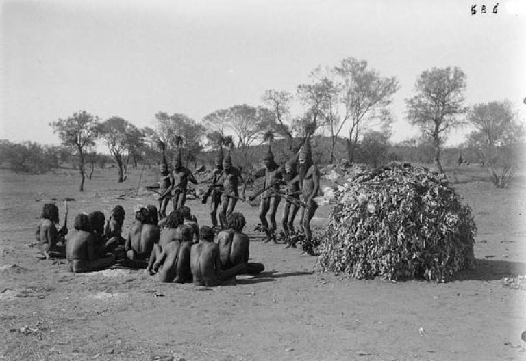 Black and white image of Arrernte men performing dances from the Tjitjingalla corroboree in Alice Springs.